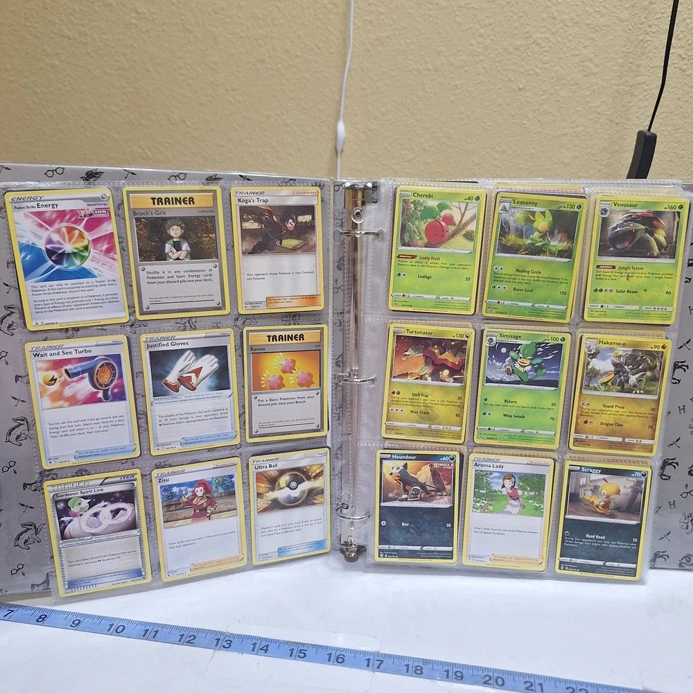 Pokémon TCG binder collection lot with approximately 171 cards from multiple set